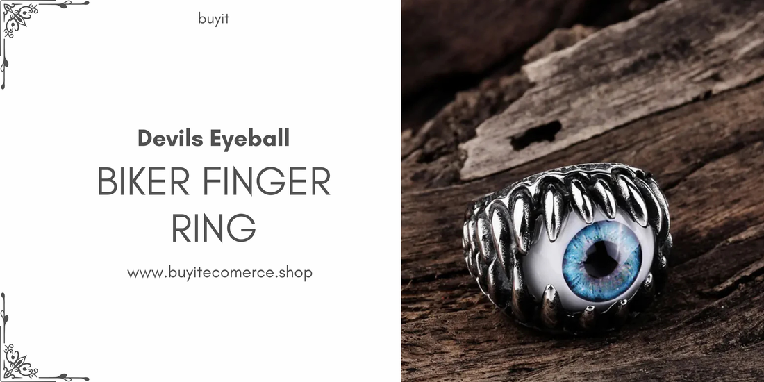 Devil’s Eyeball Biker Finger Ring in metallic design with blue eyeball centerpiece displayed on wooden surface