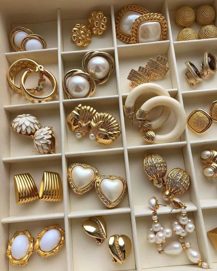 different types of earings - hoops, stud earings , statement earings