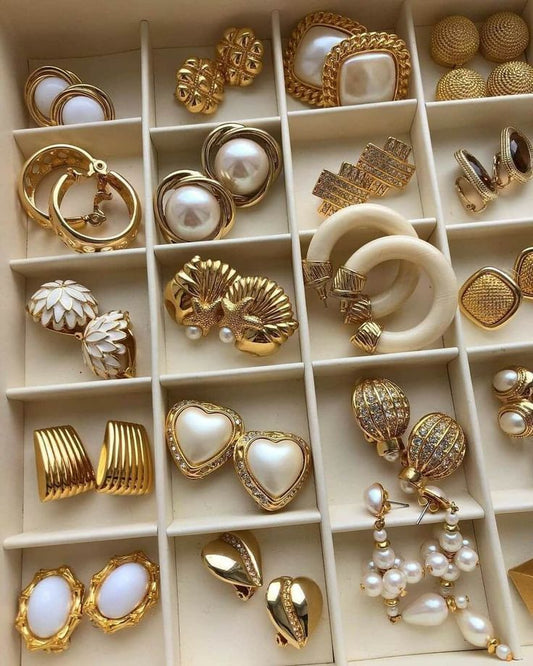 different types of earings - hoops, stud earings , statement earings