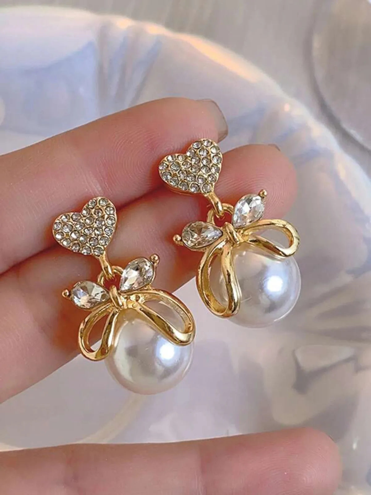 Heart drop pearl earring